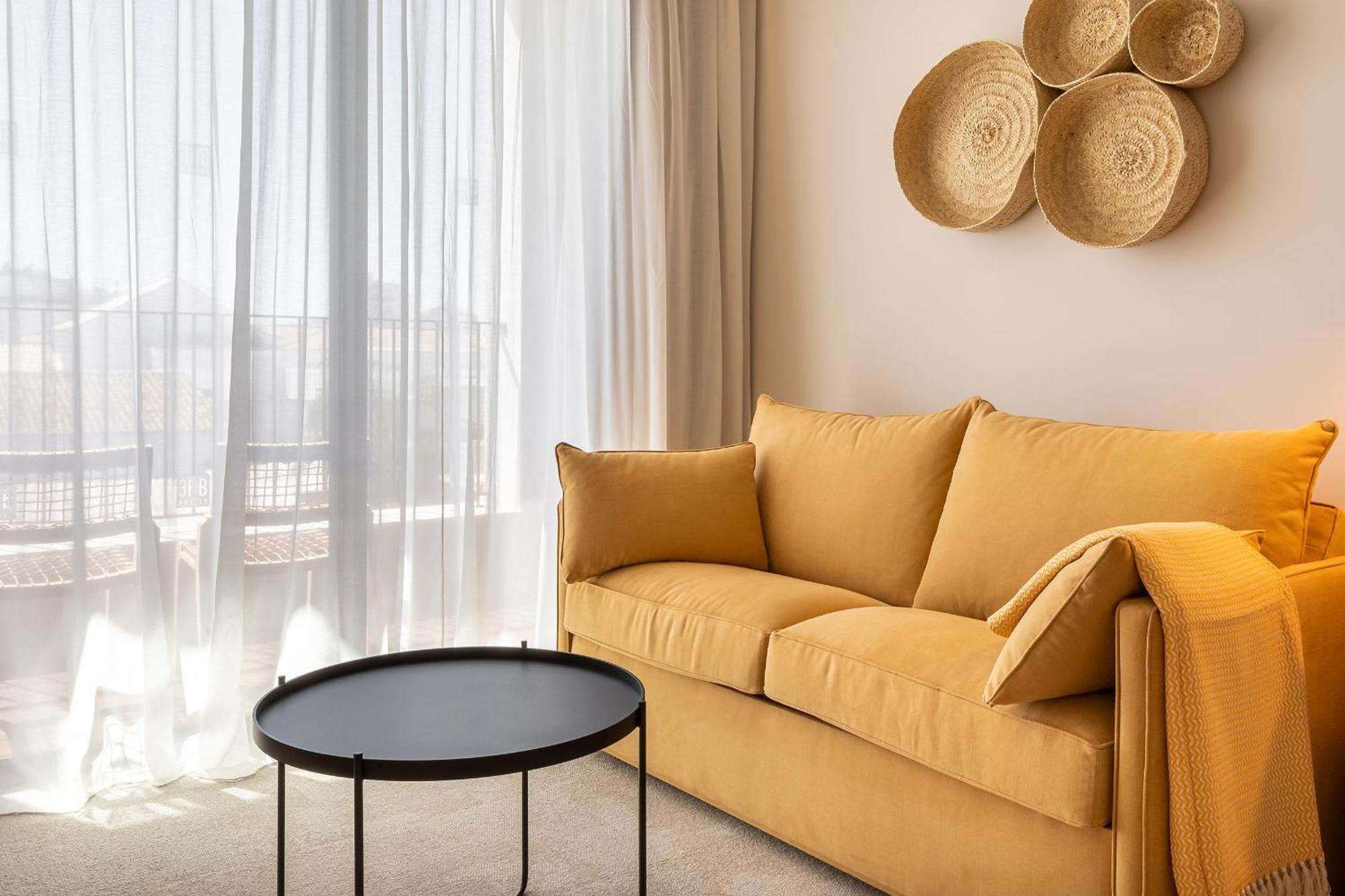 Готель 3Hb Фару Номер фото A sofa
