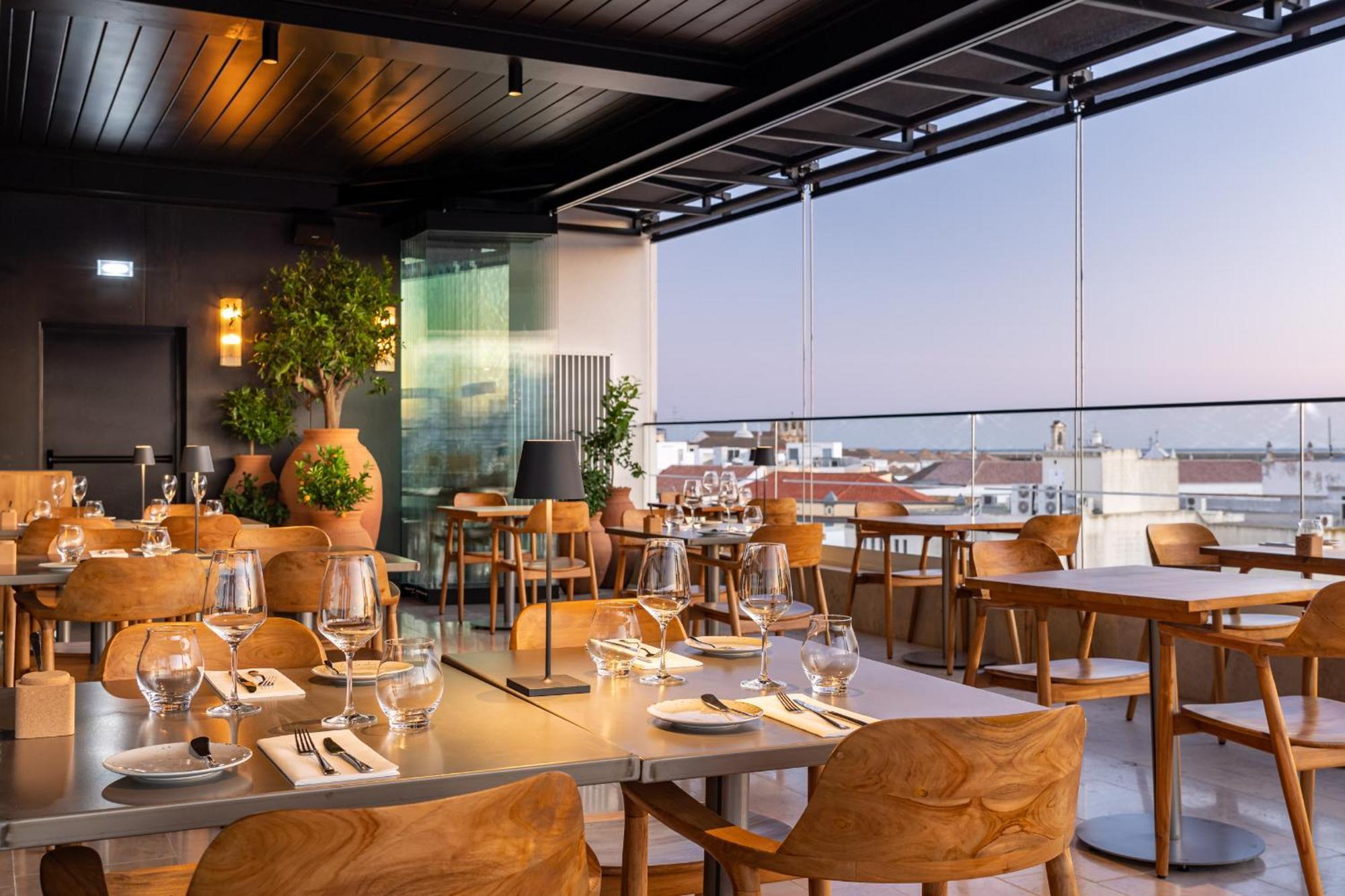 Готель 3Hb Фару Екстер'єр фото The restaurant